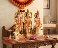 Ram Darbar Statue set on red patterned base, incense sticks and small seated figure