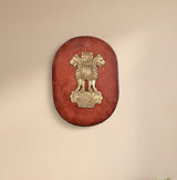 Brass Ashoka Stambh emblem wall hanging on oval wooden plaque, lion capital design