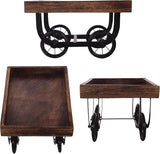 Rectangular wooden serving tray on black iron wheeled frame, angled view from front.