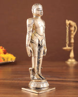 Brass Mahavir Ji Jain standing statue, profile view, ornate base