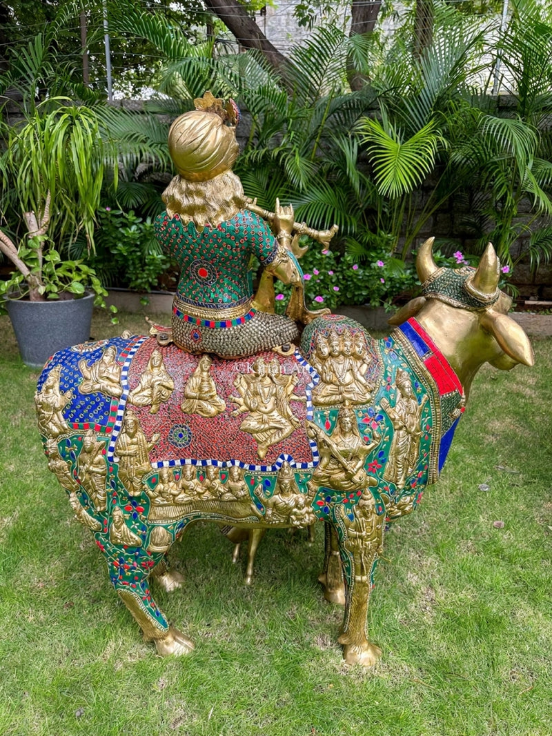 Brass Depiction of Lord Krishna with Kamadhenu and Calf (Height: 43 inches)
