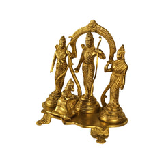 Brass Hindu deity statue with three standing figures and central deity, ornate arched backrest