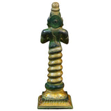 Patanjali figurine back view in green patina with gold detailing on robe and square base.