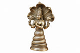 Brass Patanjali statue, golden finish, standing four-armed figure with patterned body