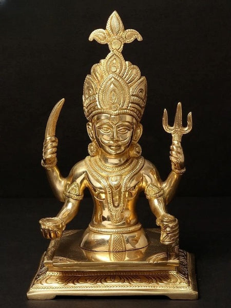 Brass Nakoda Deity of the Jains figurine, seated with four raised arms, front view.
