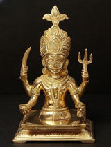 Brass Nakoda Deity of the Jains figurine, seated with four raised arms, front view.
