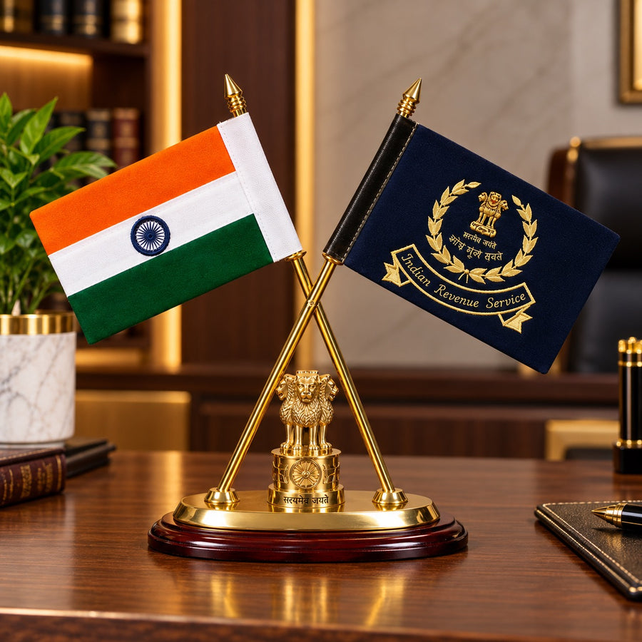 Brass table stand with crossed Indian national and IRS flags and a gold Ashoka emblem