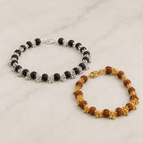 Women's bracelet set: silver-toned chain with black beads and gold-toned rudraksha beads