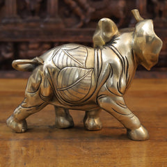 Brass elephant sculpture, 10 in, rear-side view with patterned torso and tail