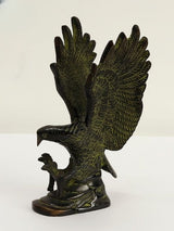 Brass eagle figurine with outstretched wings and detailed feather relief, 8 in height