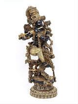 Brass Krishna idol in standing pose, flute in hand, ornate crown and gold detailing