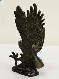 Brass eagle sculpted statue with wings spread high and tail down, detailed base, 8 in
