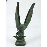 Brass green Patna eagle sculpture, wings spread upward on a dark base, 8 in height