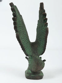 Back view of brass green Patna eagle sculpture, wings angled outward with textured feathers