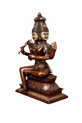 Seated four-armed Brahma figure in copper finish, cross-legged on ornate base