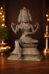 Seated Brahma statue, bronze finish, raised hands, 16-inch height
