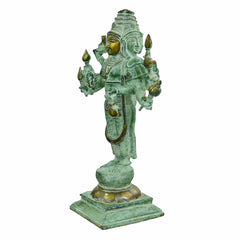 Green patina Brahma figure on square base, golden face and headdress