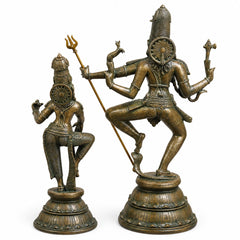 Brass Shiva dancing with trident, Parvati seated beside, antique gold and green finish
