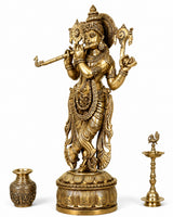 Brass Krishna deity statue holding shankh and chakra, detailed face and arms, standing