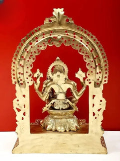 Brass Lord Narasimha statue, seated figure with halo frame, red dot accents
