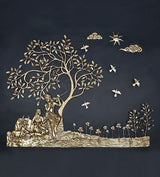 Brass Radha Krishna under tree wall hanging with birds and decorative cloud scroll motifs
