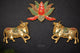Brass Kamdhenu wall decor: two decorated cows with colorful lotus medallion