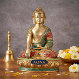 Brass Gautam Buddha statue seated in bhumisparsha mudra, multicolor jeweled robe