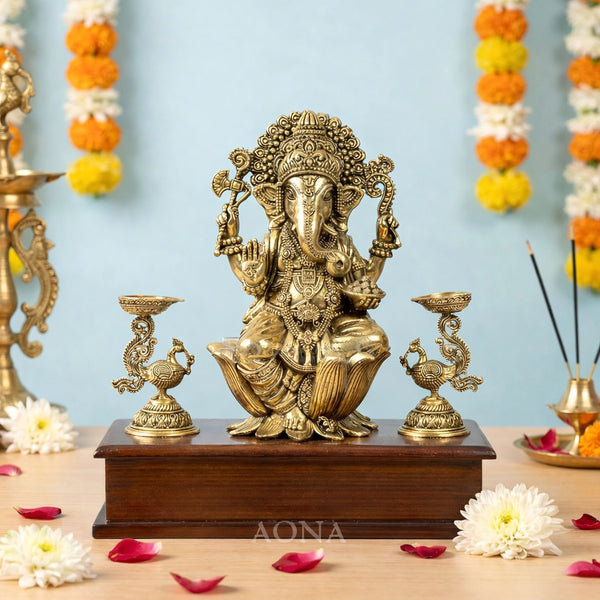 Superfine Brass Lord Ganesha Idol on Wooden Base with Peacock Oil Lamps – Elegant Decorative Statue for Home, Office, Mandir & Pooja (Height :10 Inches)