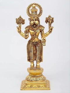 Brass Vishnu Dashavatara statue with detailed chest ornaments, halo, and two upper weapon arms.
