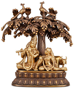 Brass Radha Krishna tree wall hanging with cows, birds, and detailed golden figures