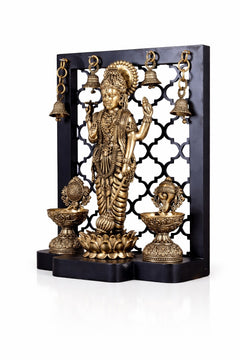 Brass Vishnu idol with diya lamps and hanging bell set on stand, 12 in
