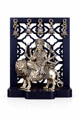 Brass Durga Mata idol riding lion with hanging bells, ornate decorative stand