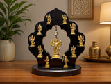 Brass Vishnu Dashavatar idol on black wooden stand with hanging bell