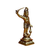 Karuppaswamy brass sculpture angled view, arched staff arm raised; detailed jewelry and base