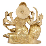 Brass Durga idol back view, detailed dress, lion base and circular halo