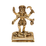 Gold-finish Mahakali idol with crown and layered ornaments; Shiva figure visible on base