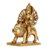 Brass Durga idol seated on lion, three-quarter angle showing lion mane and jewelry