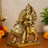 Brass Durga idol seated on lion, multi-armed goddess sculpture for home mandir