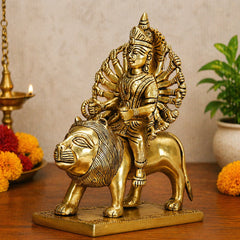 Brass Durga idol seated on lion, multi-armed goddess sculpture for home mandir