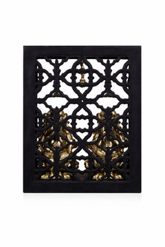Brass lattice back panel with hanging bells and golden detailing