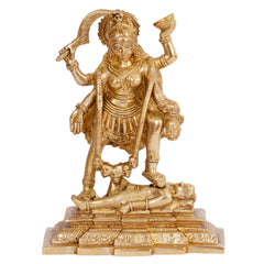 Gold-toned Kali idol statue, front view with raised right hand and detailed jewelry