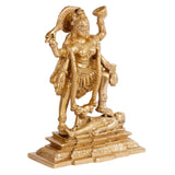 Gold-toned Kali idol figurine, angled view with draped ornaments and carved pedestal