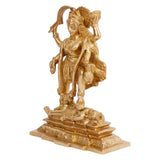 Gold-toned Kali idol statue, side view with flowing robe details and ornate base
