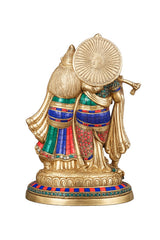 Brass Radha-Krishna statue rear view, stone inlay clothing and umbrella-like halo