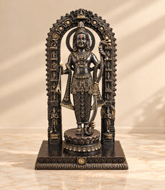 Lord Ram standing brass idol with golden-and-black patina, arched halo frame.