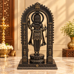 Lord Ram standing brass idol with golden-and-black patina, arched frame and raised hands.
