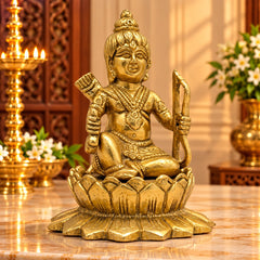 Pure brass Ram Lalla idol seated on lotus base, gold-toned finish, raised hands