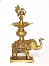 Brass peacock oil lamp on elephant pedestal statue, 11 in tall