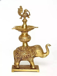 Brass peacock oil lamp on elephant pedestal statue, 11 in tall