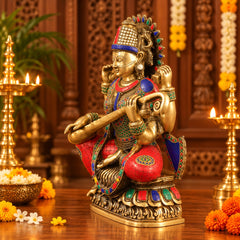 Brass Goddess Saraswati Idol Seated on Lotus with Sitar | Exquisite Stonework and Golden Finish for Home Temple & Décor (Height: 16.5 Inches)